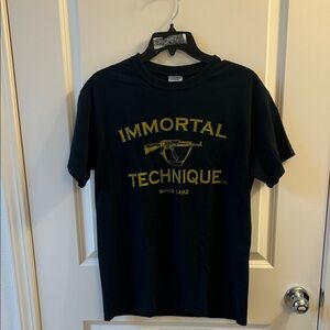 Immortal Technique Vintage Autographed shirt!
